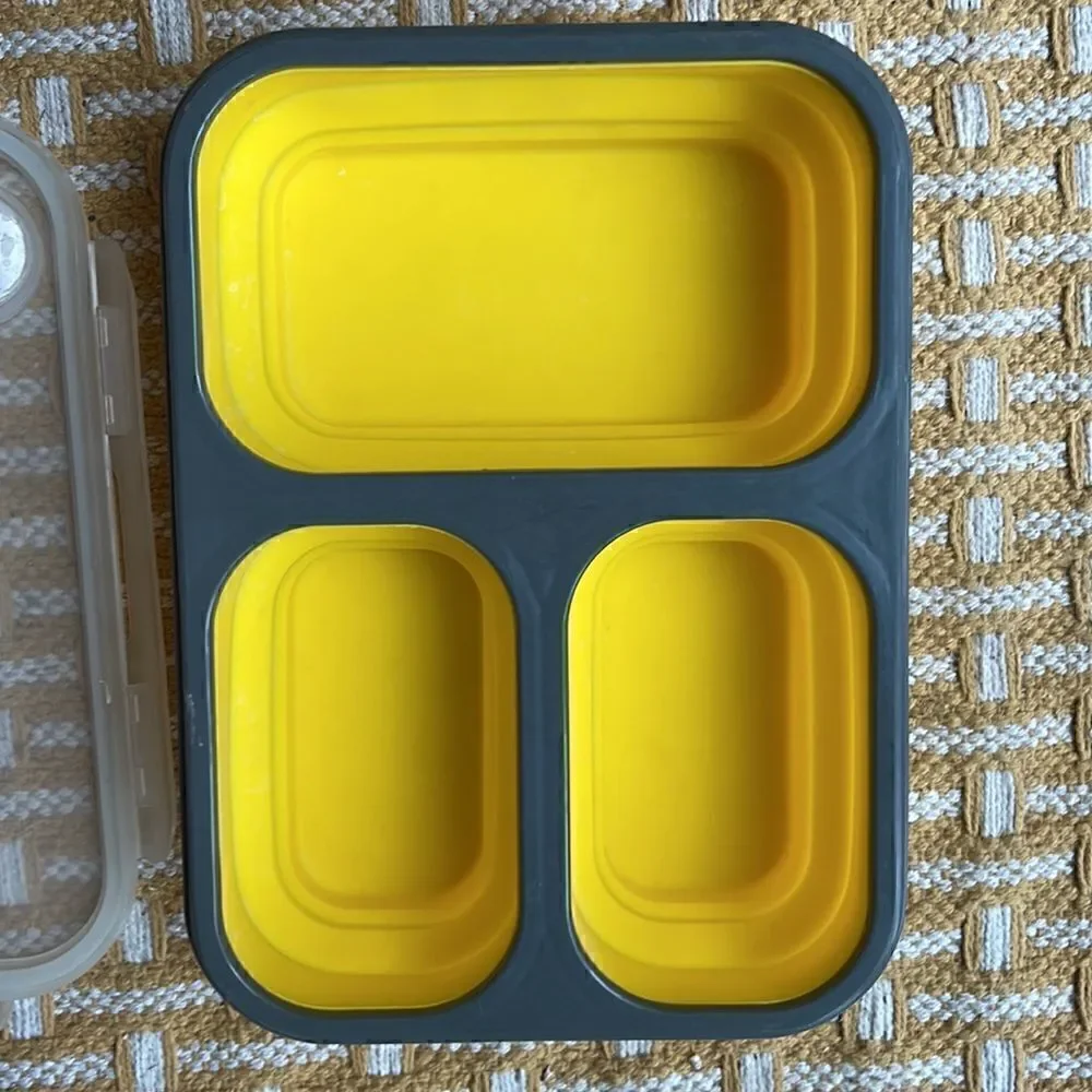 Eco One collapsible lunch box.  Snap lid with utensil pocket.  BPA free.
